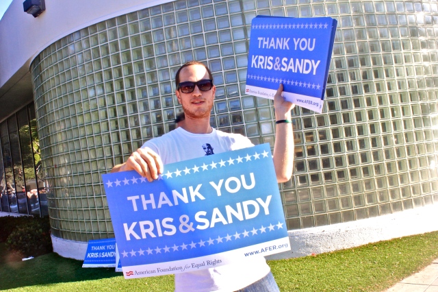 Passing out Thank You Kris and Sandy posters on San Vincente and Santa Monica Blvd. for the rally.